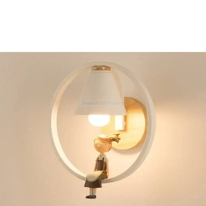 A modern white led wall lamp with wooden backplate and child figurine for bedroom wall lamps