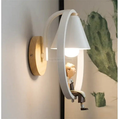 Modern white child figurine led wall lamp with curved wood arm and illuminated cone-shaped shade for bedroom use