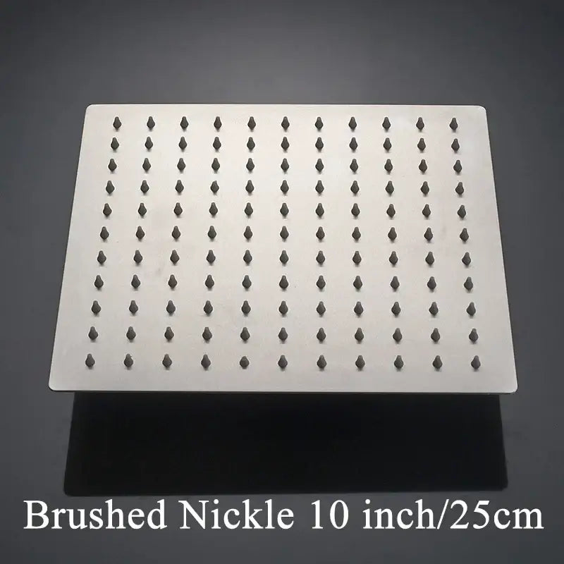 Modern white chrome brushed nickel square rainfall shower head with dark-tipped nozzles for an elegant bathroom fixture