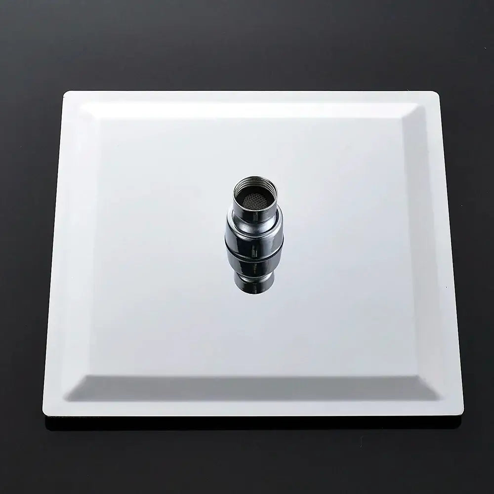 A sleek white ceramic rainfall shower head base with a polished chrome faucet adapter for modern bathrooms