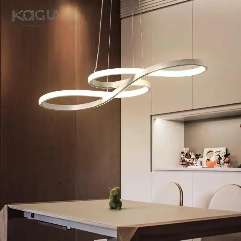 Modern white circle led chandelier with sleek infinity-shaped metallic frame and decorbites circle led illumination