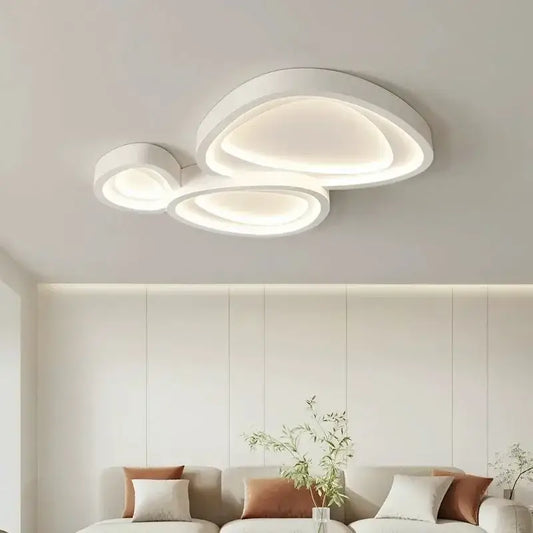 Modern white cloud designer ceiling light with layered circular rings and soft ambient glow for living room decorbites designer ceiling lights