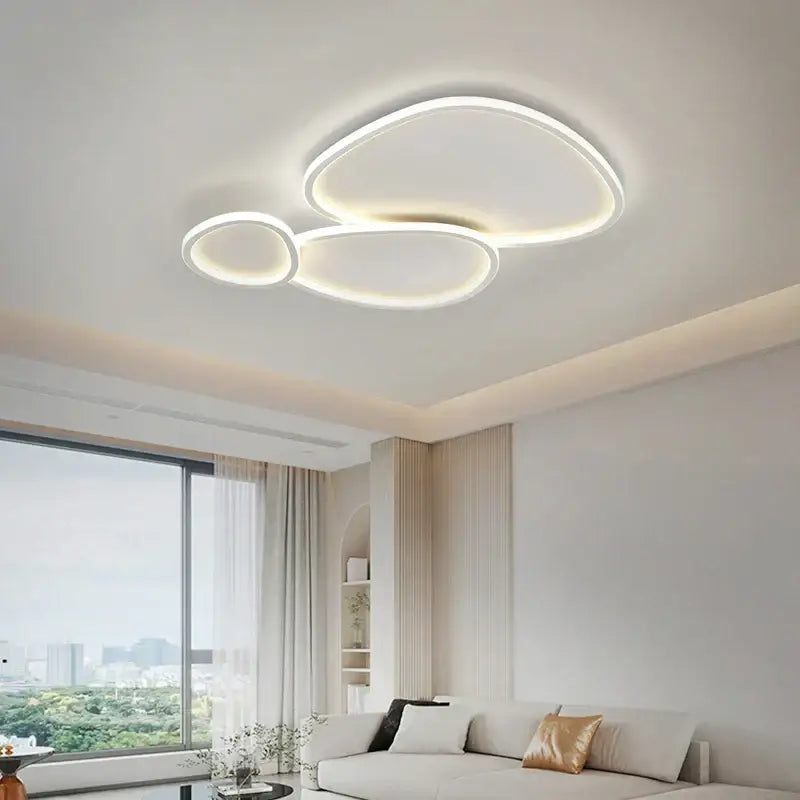 Modern white decorbites cobblestone led ceiling light with sleek overlapping oval rings for living room chandelier decor