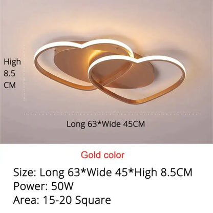 Gold-colored led pendant light with two interlocking hearts and modern minimalist design for white coffee bedroom decor