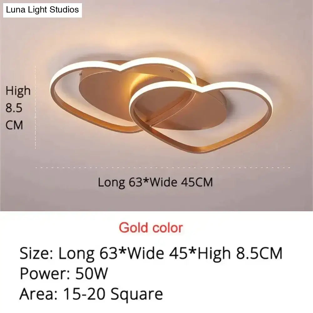 Modern white coffee pendant light with gold-colored led ceiling fixture featuring two interlocking heart shapes for bedroom
