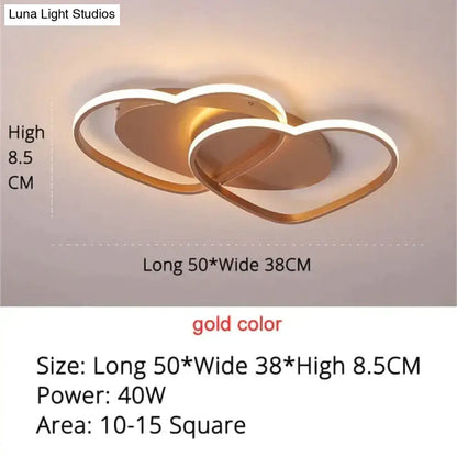 Gold-colored led pendant light with two interlocking heart shapes for modern white coffee bedroom decor