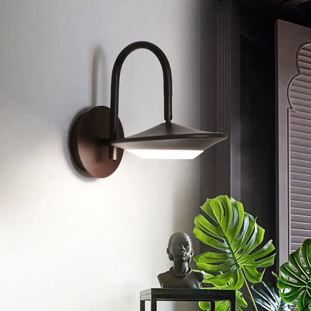 Dark bronze wall sconce lamp with curved arm and shield-shaped shade for modern bedroom led lighting