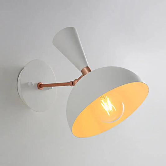 Modern white and copper rotating node dome sconce with two arms and warm filament bulb glow for 110v-120v use