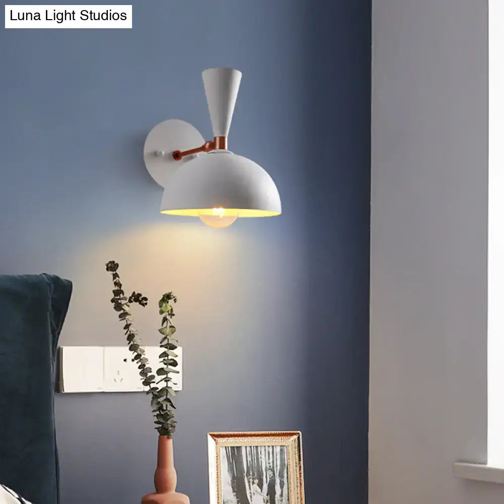 Modern white and copper dome sconce with rotating node and conical shade emitting warm light for 110v-120v use