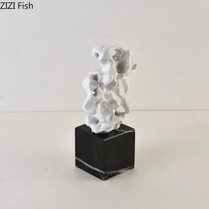Modern white coral creative resin sculpture with intricate carvings on a black marble base for living room decor
