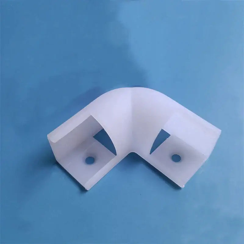 White plastic l-shaped corner bracket with two mounting holes for modern white aluminum profile led strip lights