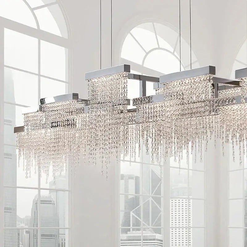 Modern white crystal tassel chandelier with chrome finish and cascading crystal droplets for dining room decorbites crystal tassel lighting