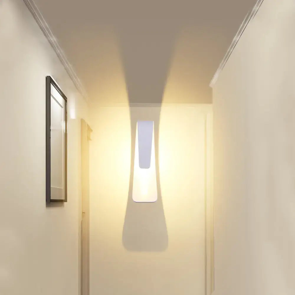 Modern white curved wall light with sleek rectangular design and warm white direct wired electric wall light for living room