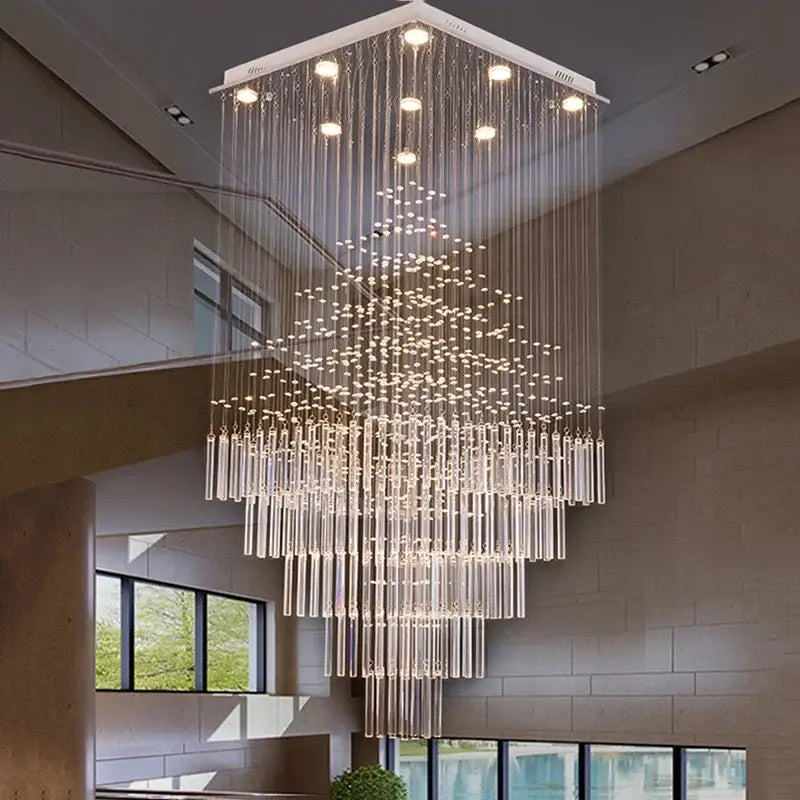 A modern white decorbites crystal ceiling chandelier with geometric frame and cascading glass rods for living room