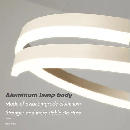 Modern white dimmable metal acrylic pendant ring light with sleek curved aluminum body for dining room decorbites dimmable metal