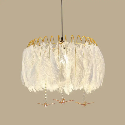 Modern white feather chandelier with gold wire frame and dangling bird ornaments for living room pendant light