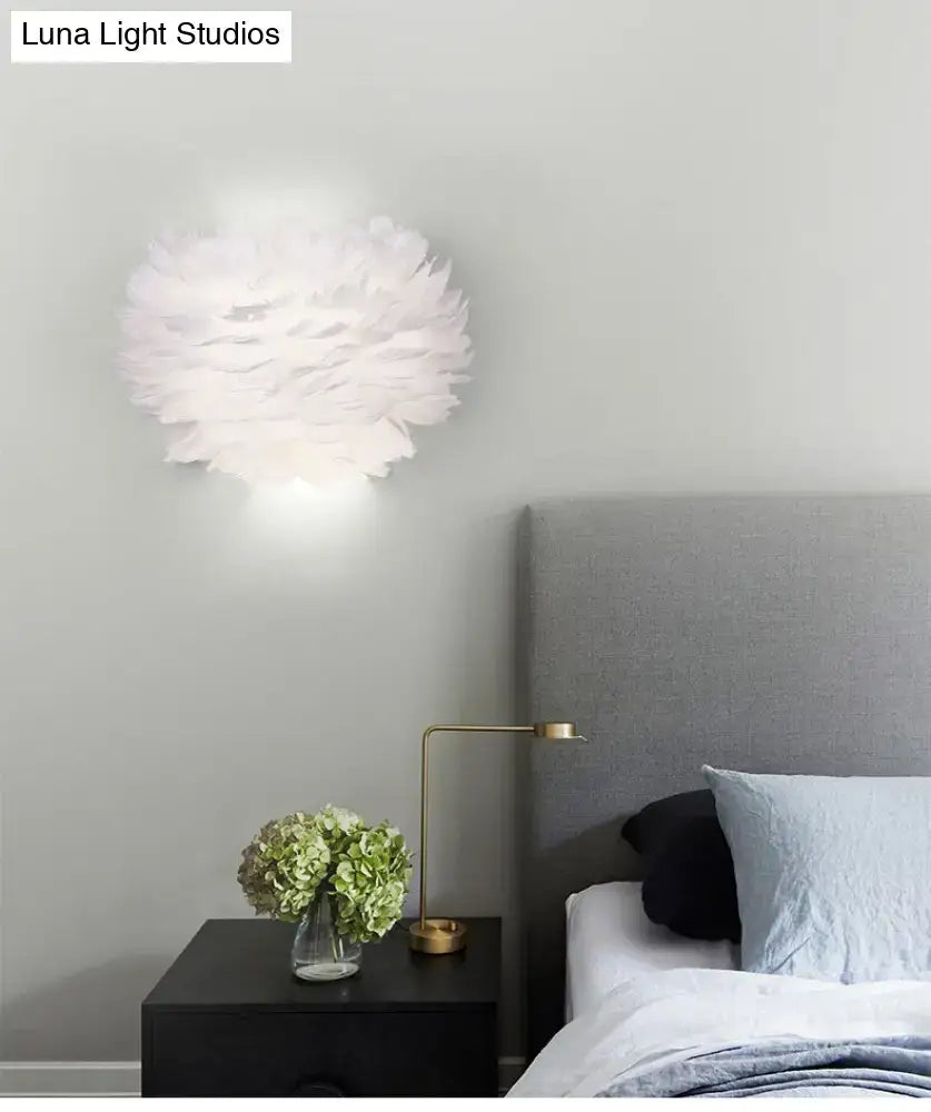 Modern white feather wall lamp with a soft cloud-shaped design for stylish home decoration wall use in bedrooms