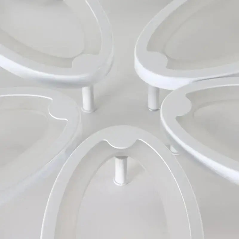 Modern white flower acrylic led ceiling chandelier featuring white oval-shaped drawer pulls with glossy finish