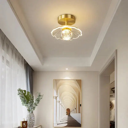 Gold-toned ceiling lamp with delicate petal-shaped crystal shade for modern white flower bedroom decorbites led ceiling lamp