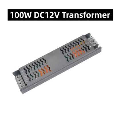 Gray rectangular 100w dc12v transformer with black and orange vents for modern white flowing led strip light wall decor