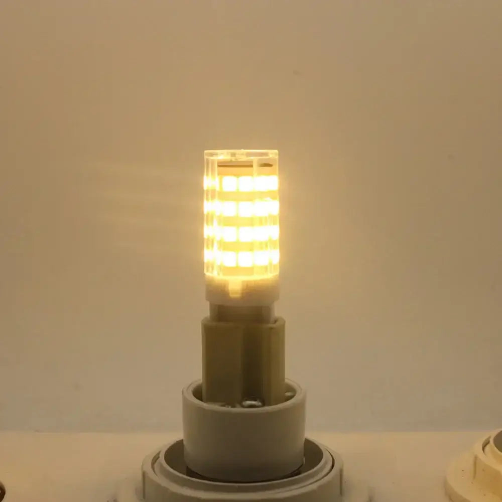 Modern white g9 led corn bulb chandelier lamp with warm white led segments in clear cylindrical glass housing for living room