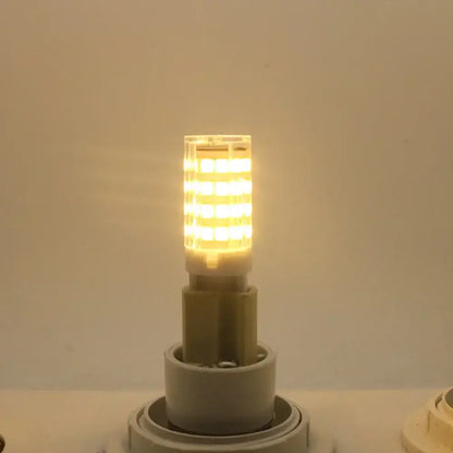 Modern white g9 led corn bulb chandelier lamp with warm white led segments in clear cylindrical glass housing for living room