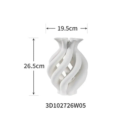 A sleek white geometric ceramic hollow vase with a twisted spiral design for modern living room decorbites decor