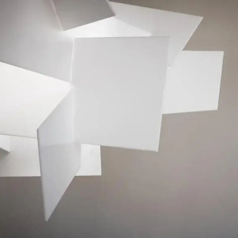 Modern white geometric stacking pendant lamp with angular overlapping panels for living room decorbites big bang design