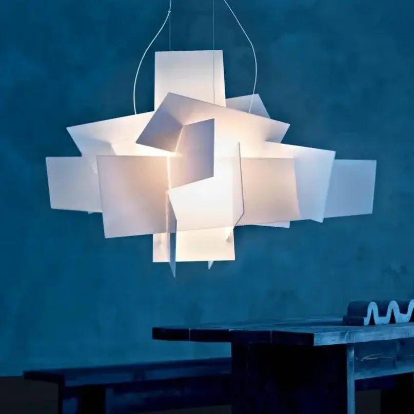Modern white geometric stacking pendant lamp with layered angular panels casting soft glow for living room decorbites big bang