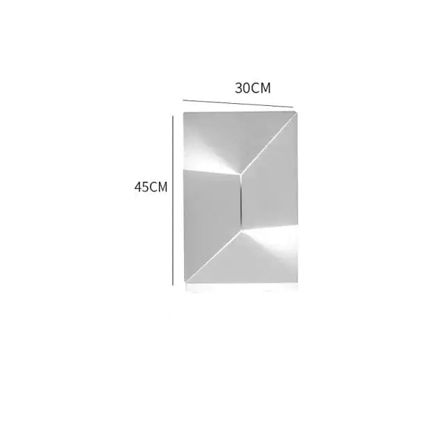 Silver metallic geometric wall panel with angular faceted design 30cm by 45cm for modern living room decor