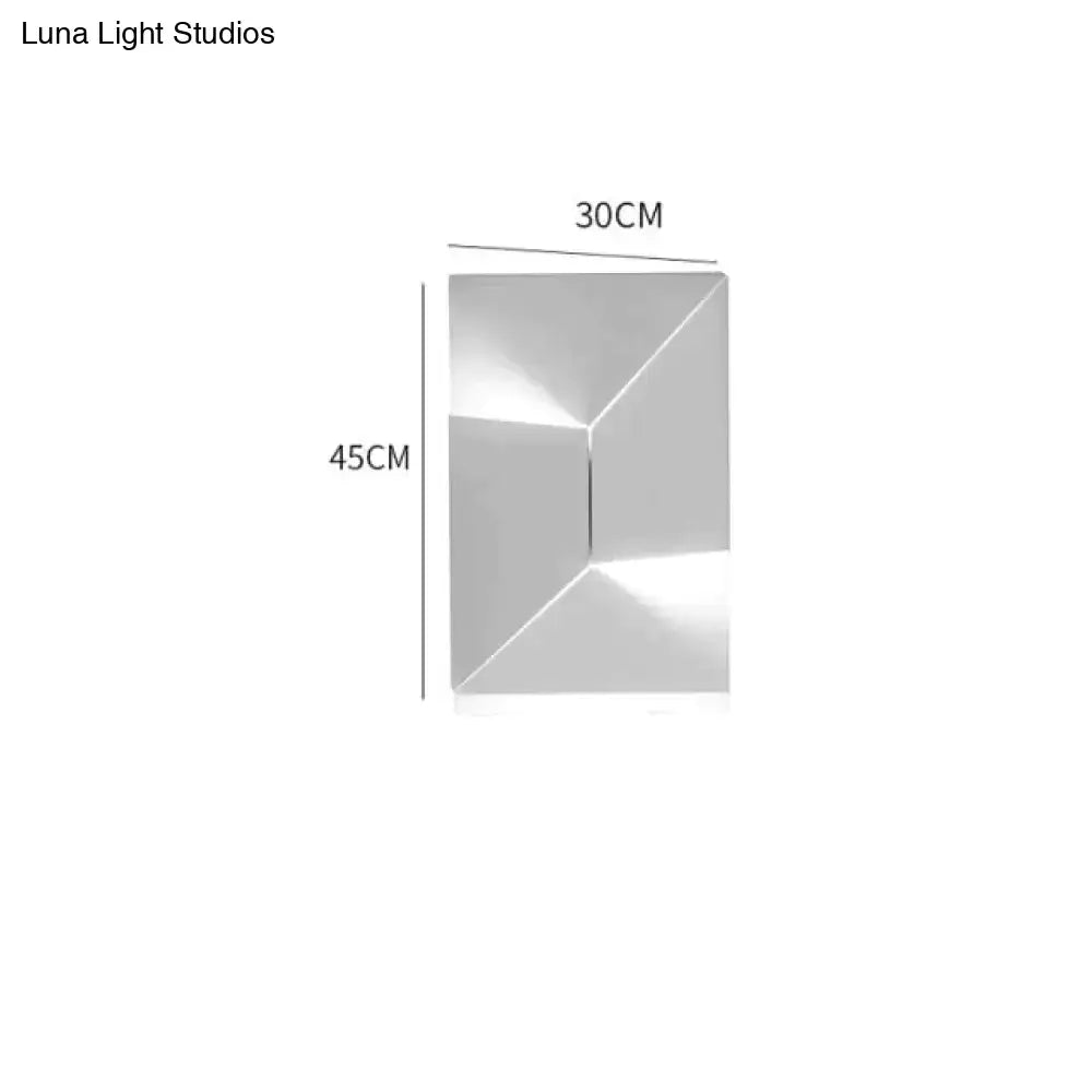 Silver geometric wall panel with modern angular design 30cm by 45cm for living room illumination and decor