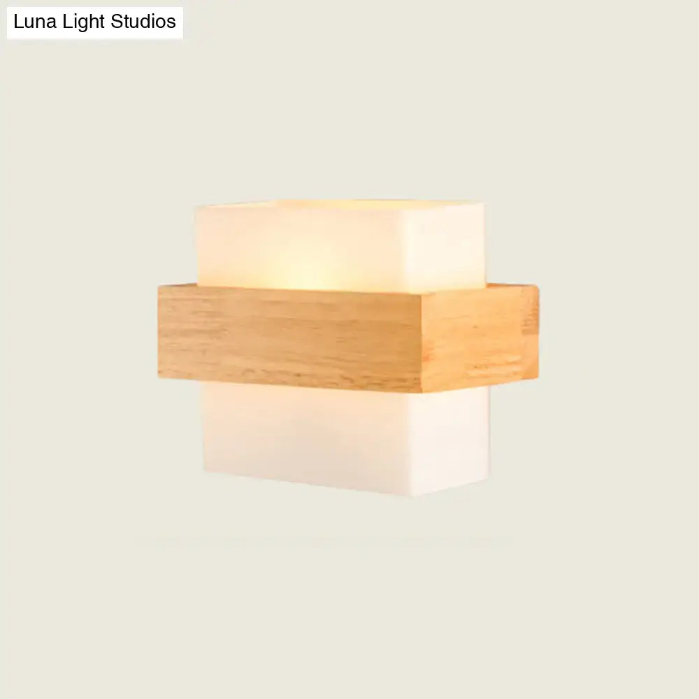 Modern white glass and wood wall light with a warm rectangular acrylic light fixture for bedroom use