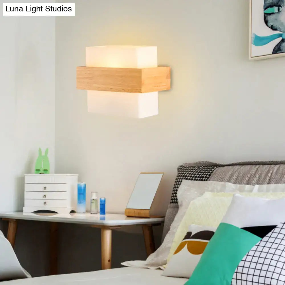 Modern white glass and wood wall light with frosted glass and warm diffused glow for bedroom modern wall light