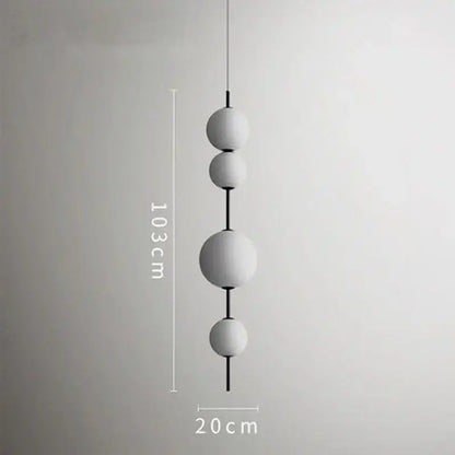 Minimalist modern white glass ball led pendant light with matte finish and black connectors for kitchen and dining room decorbites glass ball