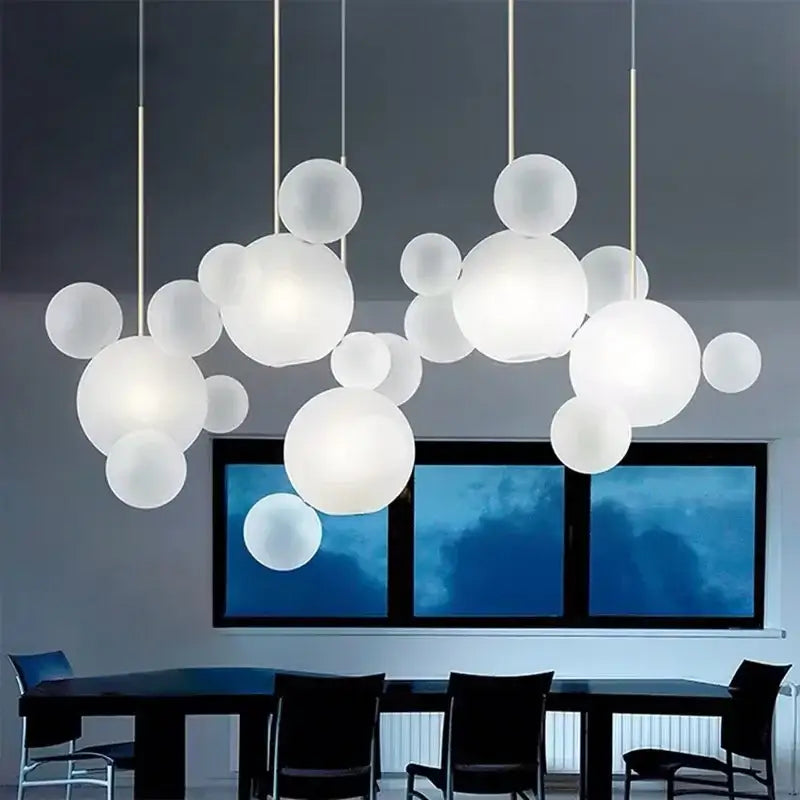 Modern white pendant light cluster with frosted glass globes by decorbites glass bubble chandelier for living room decor