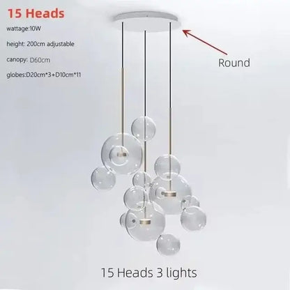 Modern white glass bubble chandelier with gold-toned metal rods and round white canopy pendant light decorbites glass bubble
