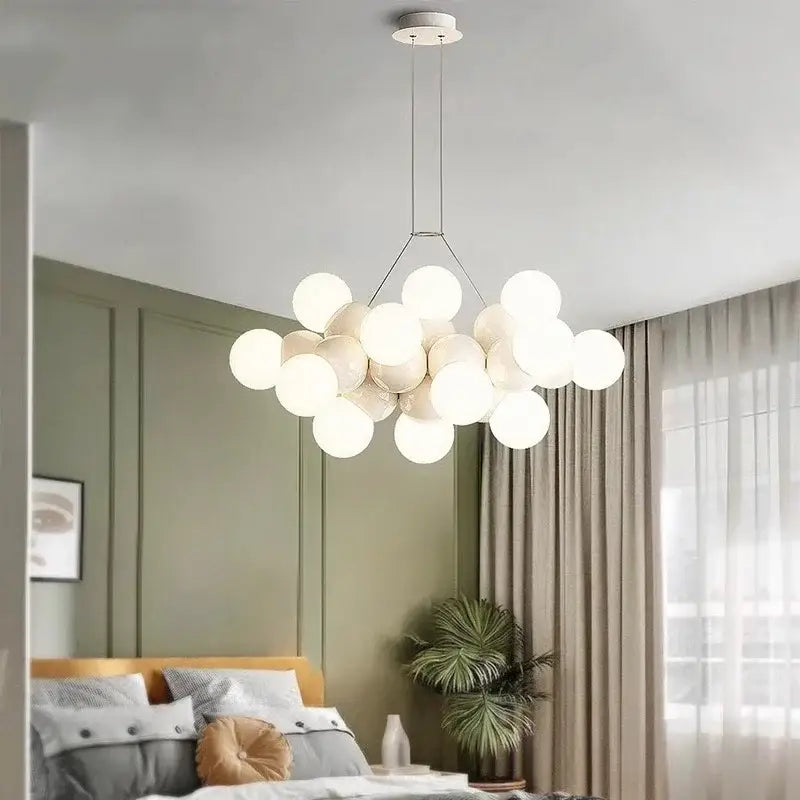 Modern white glass globe pendant light fixture with minimalist metal frame for dining room lighting