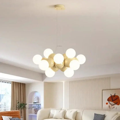 Cream-colored glass globe pendant light fixture with modern cluster design ideal for dining room lighting