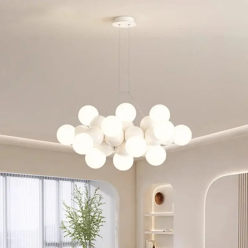 Modern white glass globe pendant light fixture with spherical design ideal for dining room pendant light