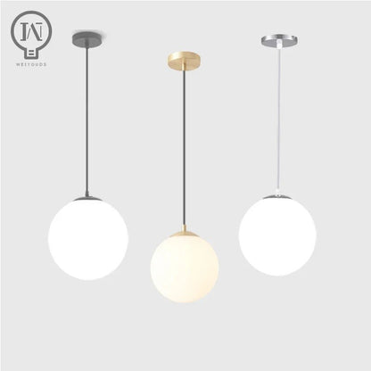Modern White Globe Glass Pendant Light in Gold, Black, or Silver - Decorbites