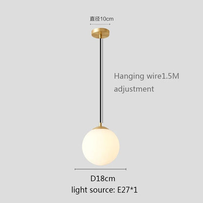 Modern White Globe Glass Pendant Light in Gold, Black, or Silver - Decorbites