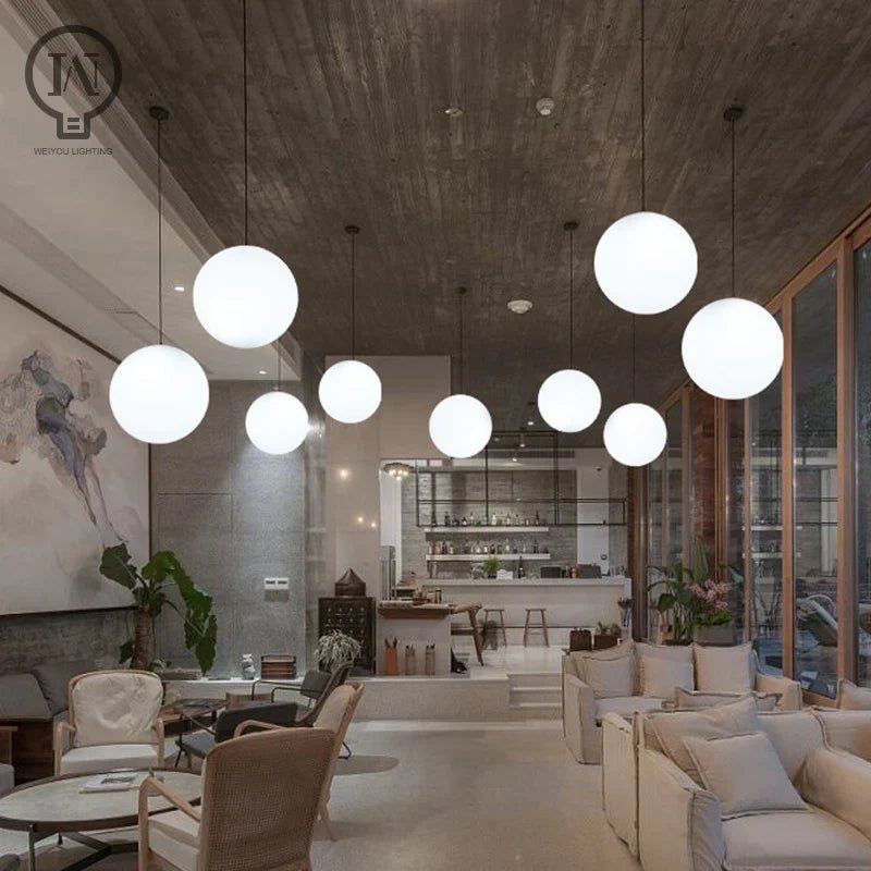 Modern White Globe Glass Pendant Light in Gold, Black, or Silver - Decorbites