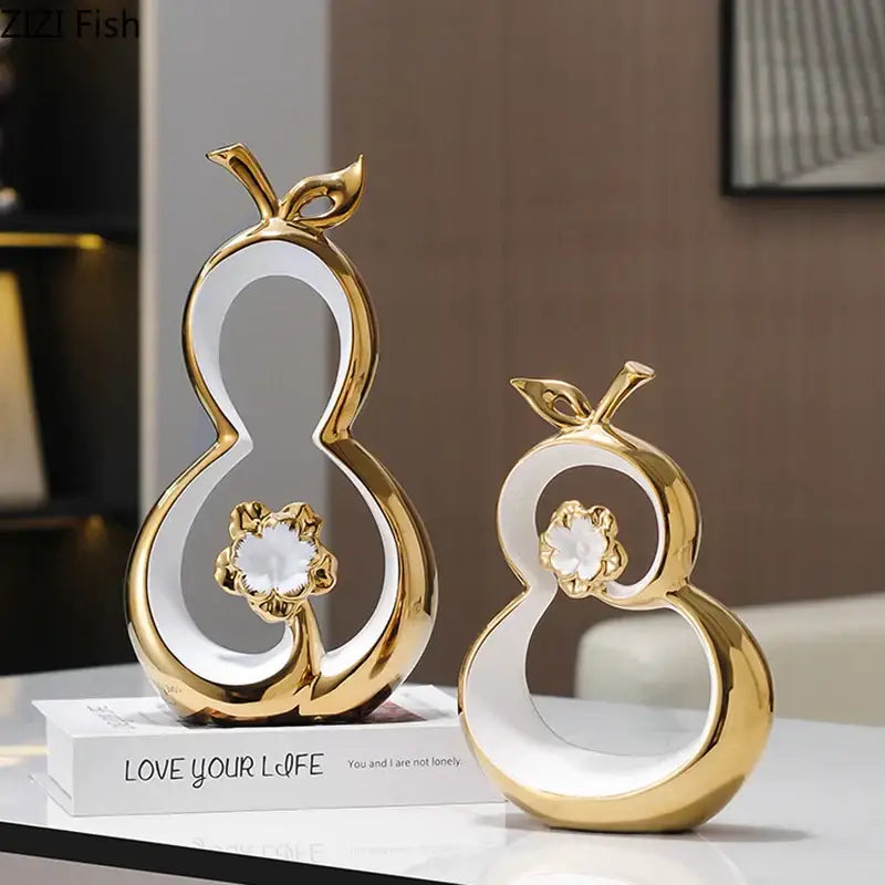 Modern white and gold ceramic gourd desk decoration featuring decorbites golden gourd with white interiors and floral embellishments