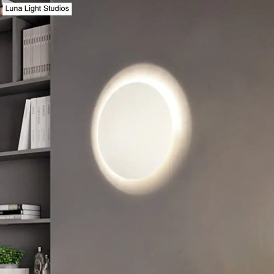 Modern white and gold circular wall light with warm white LED and soft diffused glow for bedroom use