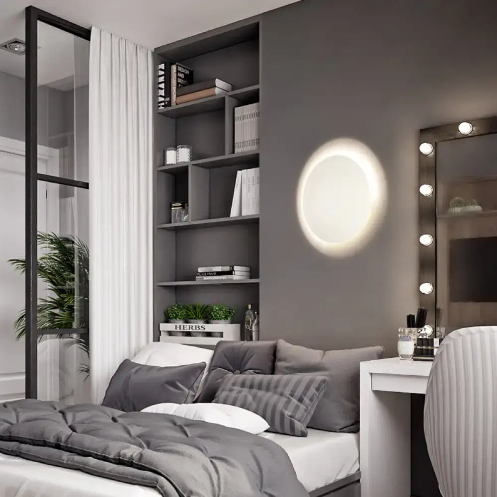 Modern white and gold circular led wall light with warm white illumination for bedroom featuring soft glowing ring