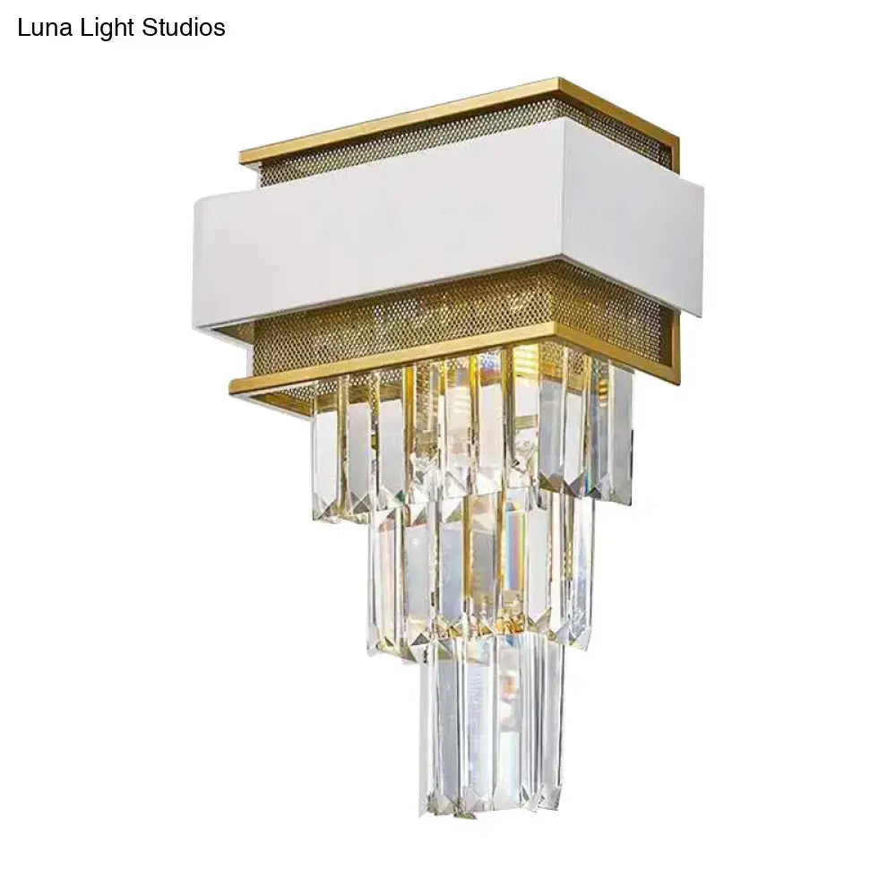 Elegant modern wall sconce with white and gold geometric frame and cascading clear crystal prisms wall lamp