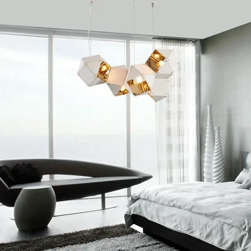Modern white and gold metallic geometric cube led pendant light from decorbites for dining room decor