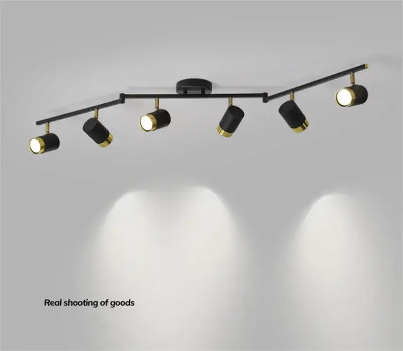 Black and gold decorbites ceiling chandelier with five adjustable spotlights for modern living room lighting