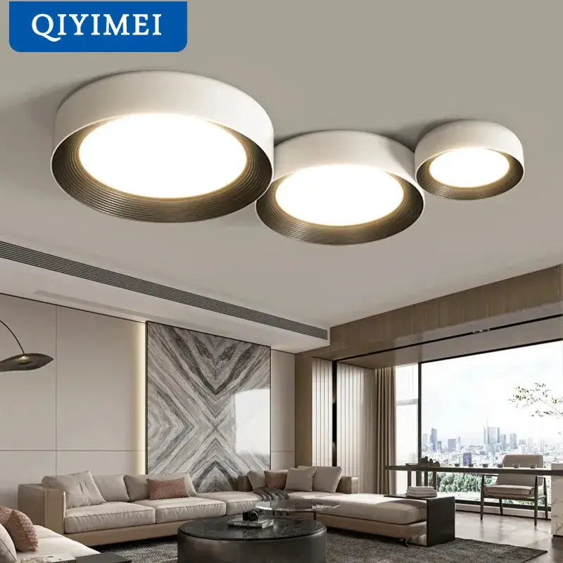 Modern white and gold decorbites circular chandelier with sleek minimalist design for dining room lighting