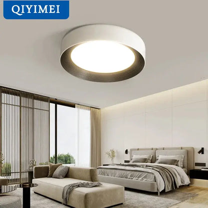 Modern decorbites circular chandelier light featuring a white outer ring and dark metallic inner rim by qiyimei